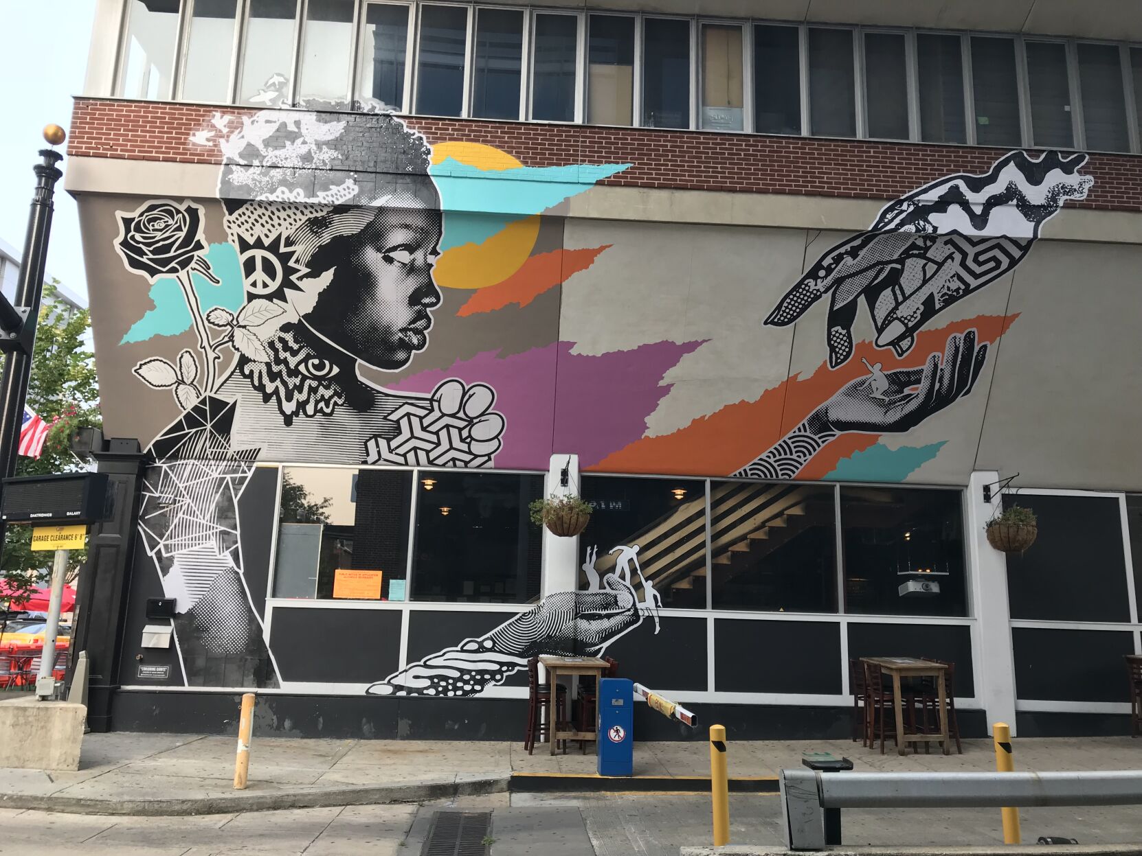 'Conjuring Giants' mural by Adam Serrano
